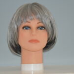 short grey synthetic wig on mannequin head