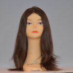 long brown human hair wig on mannequin head