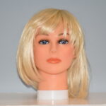short blonde synthetic wig on mannequin head