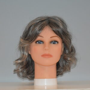 medium length synthetic gray wig on mannequin head