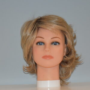 short blonde synthetic wig on mannequin head