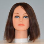 short brown human hair wig on mannequin head