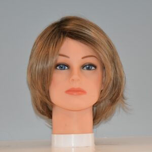 short blonde synthetic wig on mannequin head