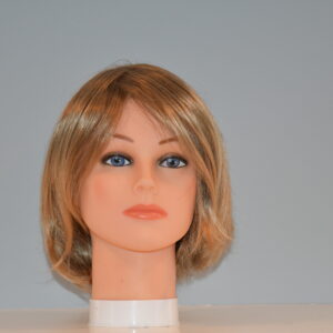 short blonde synthetic wig on mannequin head