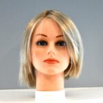 short blonde synthetic wig on mannequin head