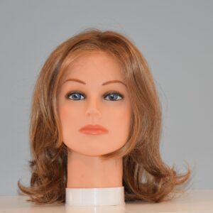 medium red synthetic wig on mannequin head