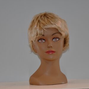 short blonde synthetic wig on mannequin head