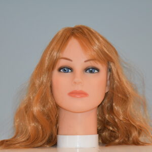 medium length red synthetic wig on mannequin head