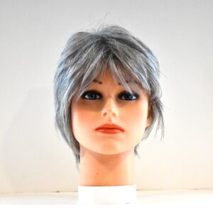 short gray synthetic wig on mannequin head