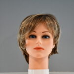 short blonde synthetic wig on mannequin head