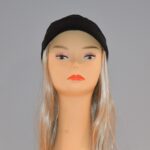 long blonde synthetic wig attached to hat on mannequin head