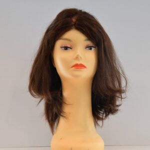 medium length brown human hair wig on mannequin head