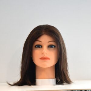 long brown human hair wig on mannequin head