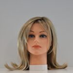 long blonde synthetic wig on mannequin head