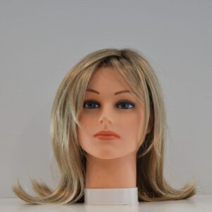 long blonde synthetic wig on mannequin head