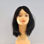 medium length black synthetic wig on mannequin head
