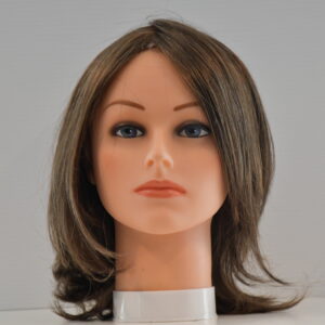 medium length synthetic wig on mannequin head