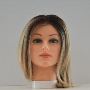 medium length blonde synthetic wig on mannequin head