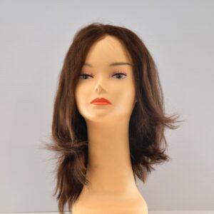 long brown synthetic wig on manequin head