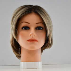 short blonde synthetic wig on mannequin head